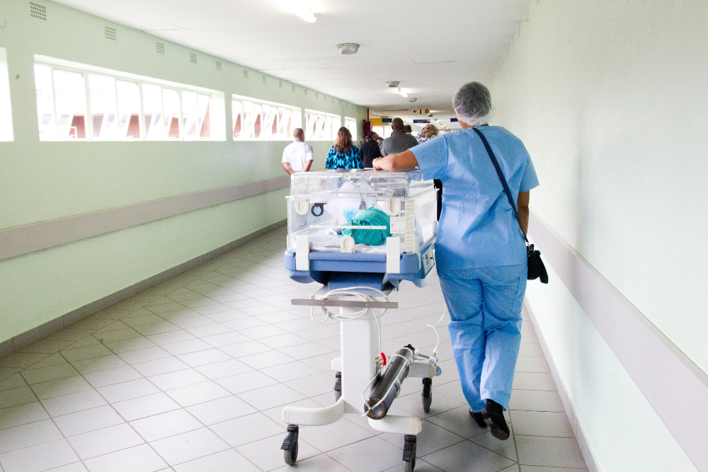 baby in hospital hallway